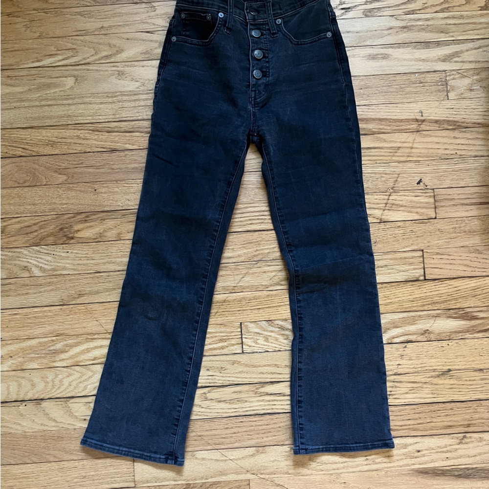 Button up, stretchy, slightly flared (washed) black Madewell Jeans.